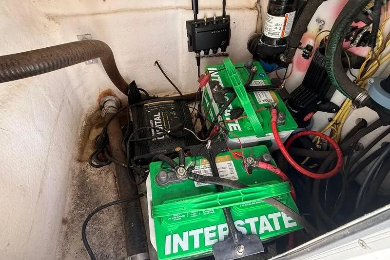 Slide: The Image of Battery compartment of a 2003 Robalo R230 Center Console boat with Interstate batteries. - 7