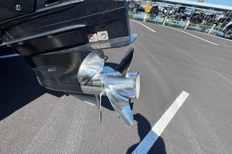 Slide: The Image of Propeller of a 2021 Crest RS250 boat in a parking lot. - 13