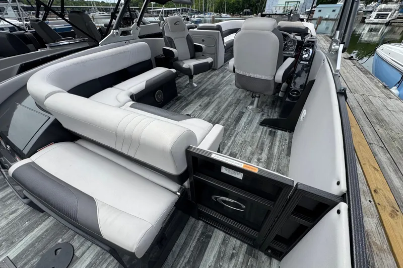 Slide: The Image of Interior of a 2021 Crest RS250 boat with modern seating and sleek design. - 37
