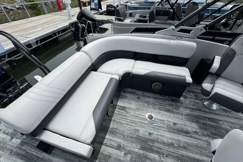 Slide: The Image of 2021 Crest RS250 boat interior with gray seating and modern design. - 44