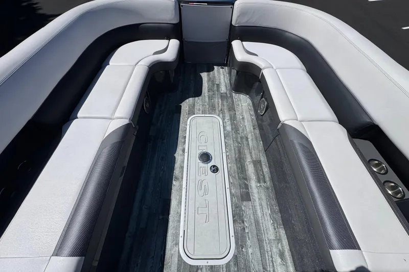 Slide: The Image of Interior of 2021 Crest RS250 boat with spacious seating and sleek flooring. - 48