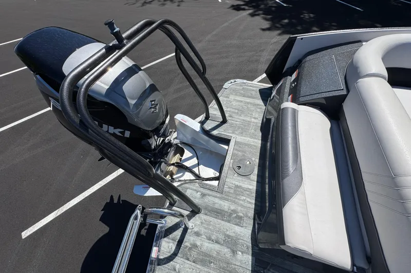 Slide: The Image of 2021 Crest RS250 boat with Suzuki outboard motor and comfortable seating. - 50