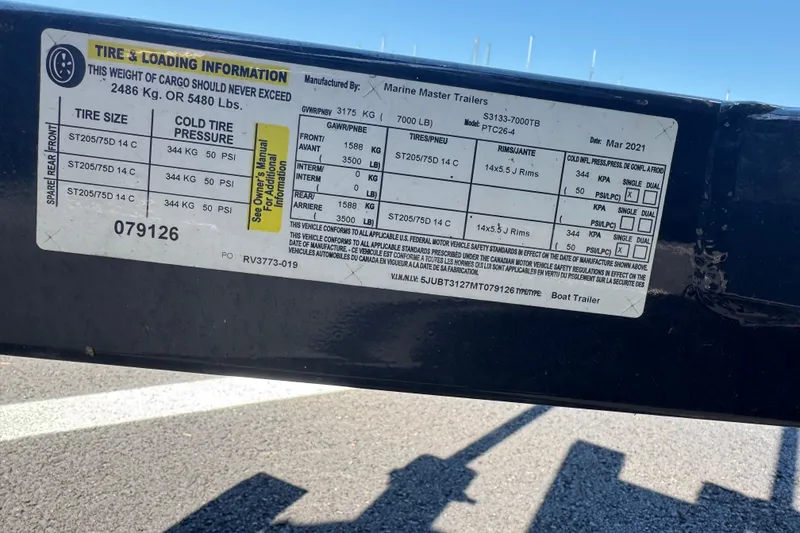 Slide: The Image of Tire and loading information label on a 2021 Crest RS250 boat trailer. - 51
