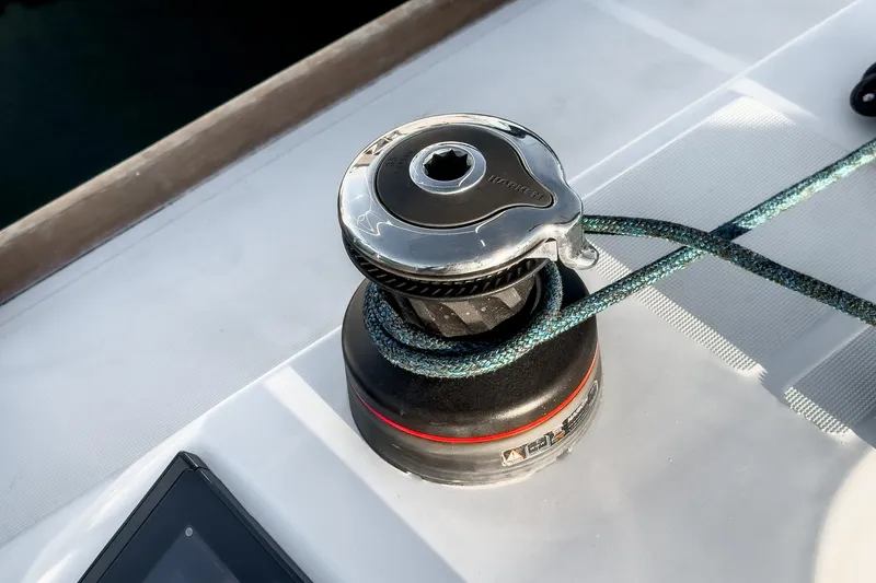 Slide: The Image of Winch on Jeanneau Sun Odyssey 349 sailboat, 2022 model, with rope wrapped around. - 44