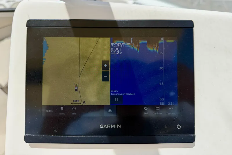 Slide: The Image of Garmin marine display on 2024 Key West 239 DFS boat, showing navigation and sonar data. - 15