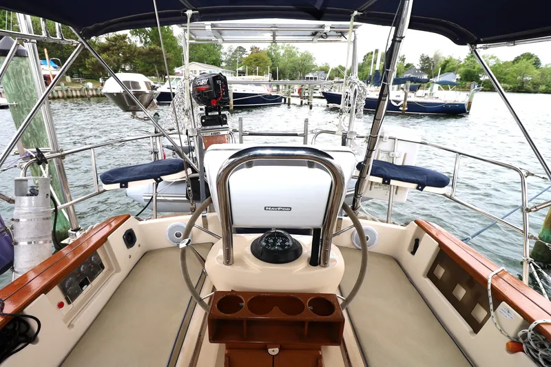 Slide: The Image of Cockpit view of 2001 Island Packet 380 sailboat docked at marina. - 24
