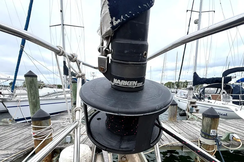 Slide: The Image of Harken winch on 2001 Island Packet 380 sailboat docked at marina. - 32