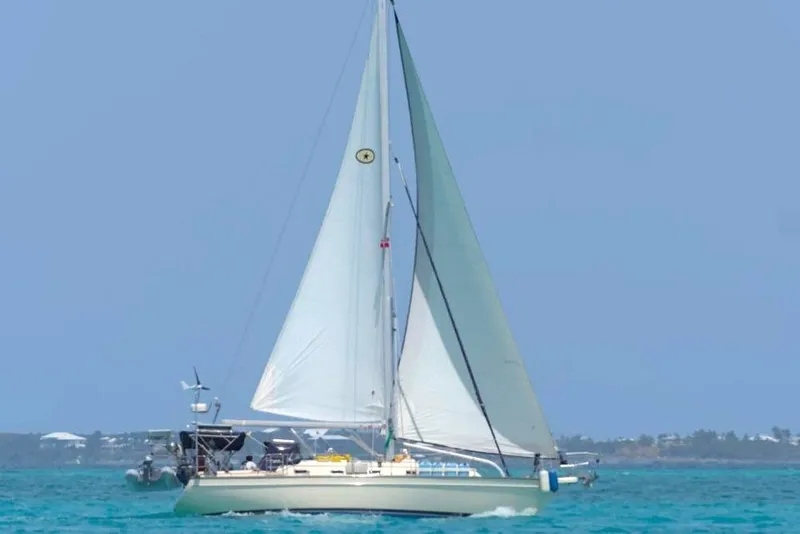 Slide: The Image of Sailing yacht Island Packet 380, 2001 model, cruising on turquoise waters. - 50