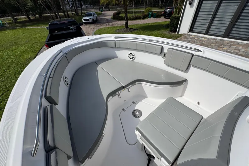 Slide: The Image of 2022 Aquasport 2500 Center Console boat with spacious seating and modern design. - 36