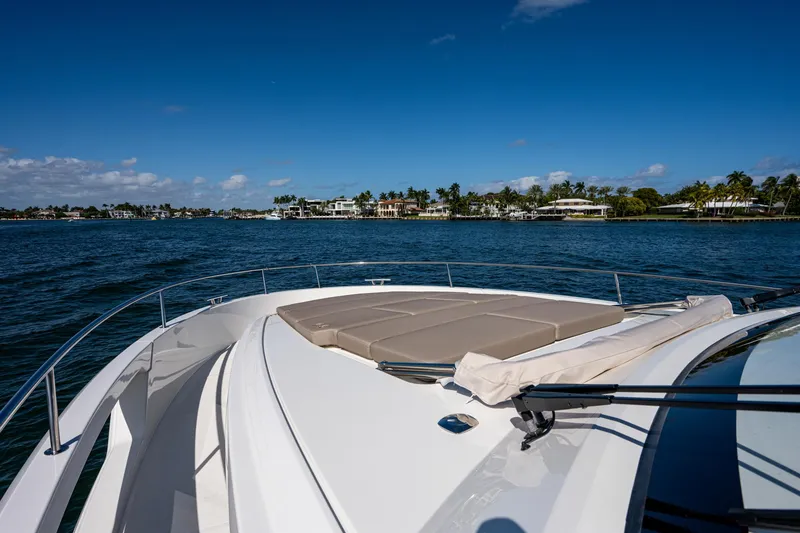 Slide: The Image of Greenline 45 Fly 2022 on calm waters with blue sky. - 17