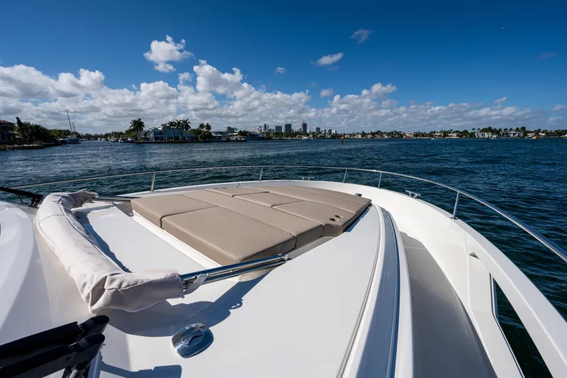 Slide: The Image of Greenline 45 Fly 2022 on open water with city skyline. - 18