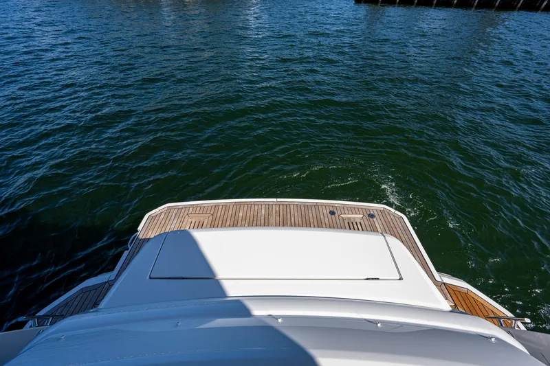 Slide: The Image of Rear view of 2022 Greenline 45 Fly yacht on the water. - 30