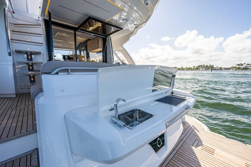 Slide: The Image of Greenline 45 Fly 2022 yacht with outdoor kitchen by the sea. - 32