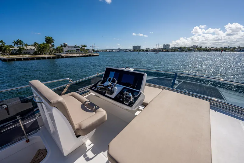 Slide: The Image of Greenline 45 Fly 2022 yacht on open water with helm station. - 37