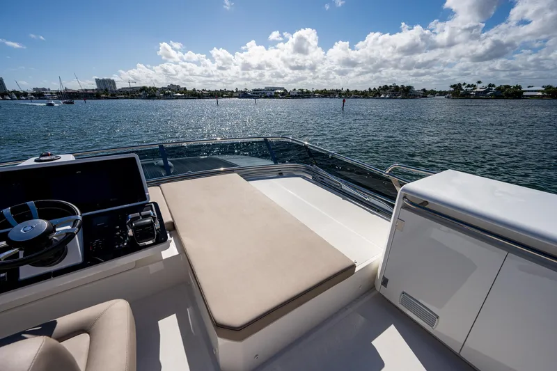 Slide: The Image of Greenline 45 Fly 2022 on water with helm and sunbed. - 38