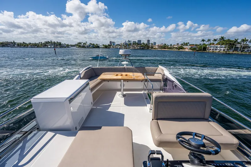 Slide: The Image of Greenline 45 Fly 2022 on open water with sunny skies. - 40