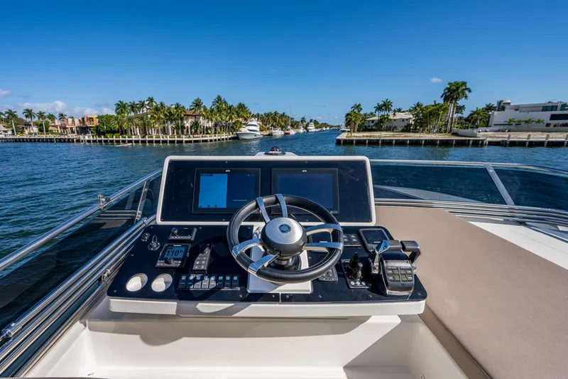 Slide: The Image of Helm of Greenline 45 Fly yacht, 2022 model, on open water. - 42