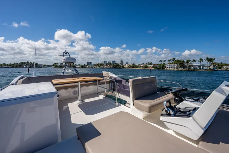 Slide: The Image of Greenline 45 Fly 2022 on open water with city view. - 43