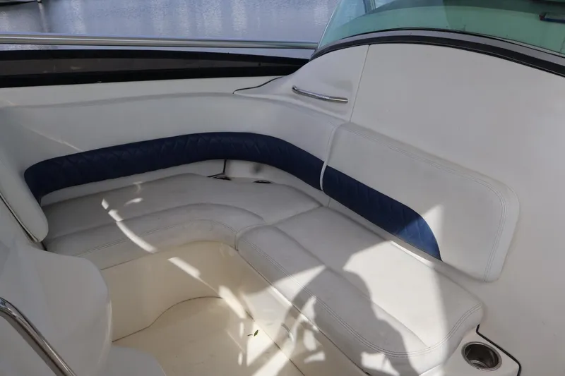 Slide: The Image of 2006 Hydra-Sports Vector 3300 VX boat interior with white and blue seating. - 6