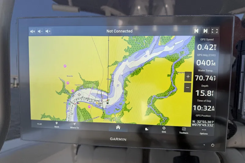 Slide: The Image of Garmin navigation display on 2023 Cobia 350 Center Console, showing map and GPS data. - 12