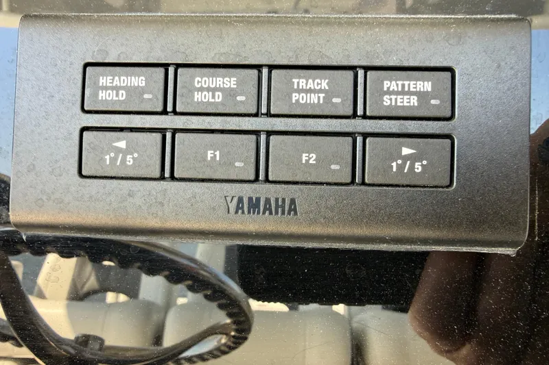 Slide: The Image of Yamaha control panel on 2023 Cobia 350 Center Console boat dashboard. - 17