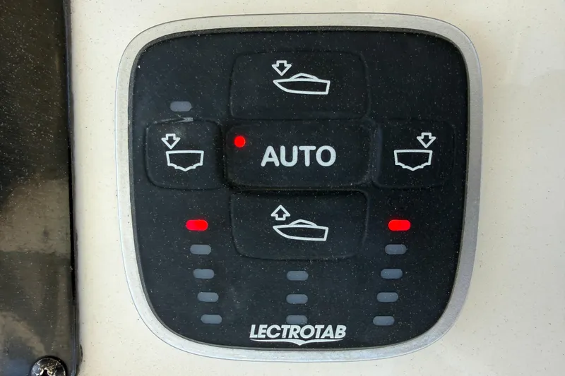 Slide: The Image of Control panel of a 2023 Cobia 350 Center Console boat with Lectrotab system. - 20