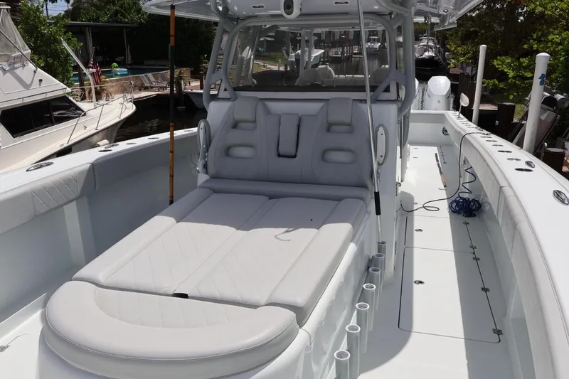 Slide: The Image of 2021 Freeman 42LR boat with spacious deck and comfortable seating. - 13