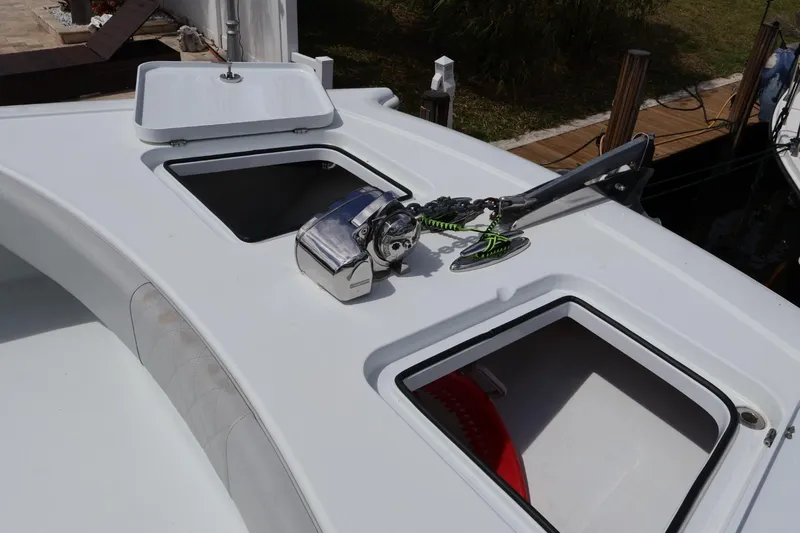Slide: The Image of Freeman 42LR 2021 boat deck with anchor and storage compartments. - 15