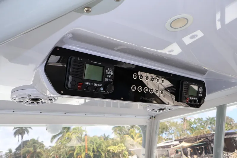 Slide: The Image of 2021 Freeman 42LR boat console with electronic controls and communication devices. - 3
