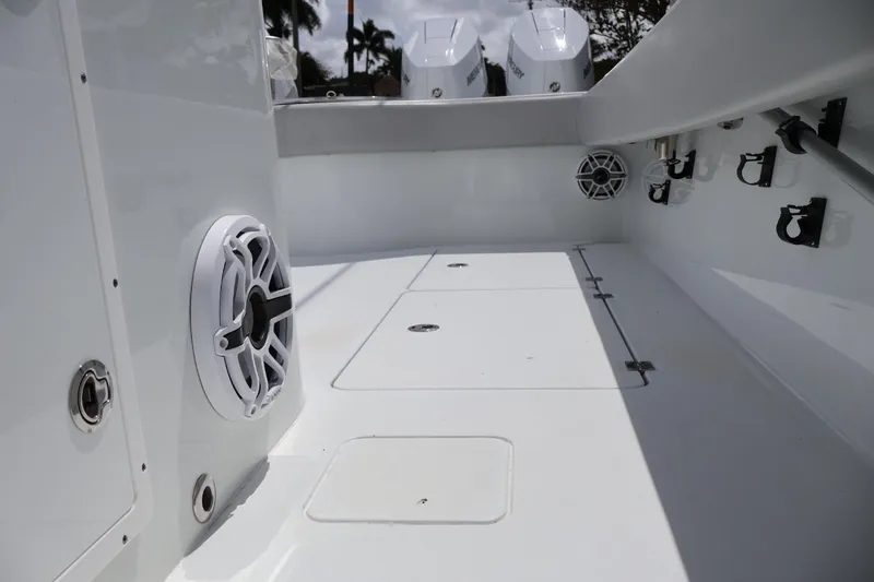 Slide: The Image of Freeman 42LR 2021 boat interior with speakers and storage compartments. - 5