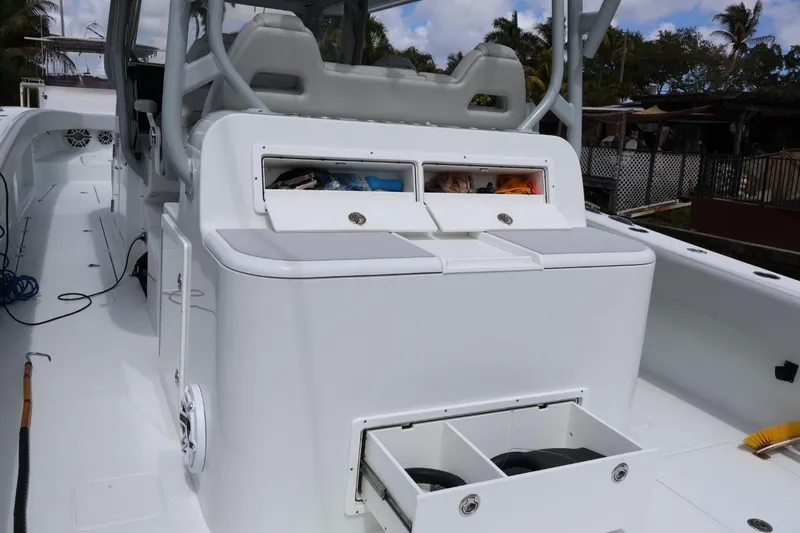 Slide: The Image of 2021 Freeman 42LR boat interior with storage compartments and seating. - 8