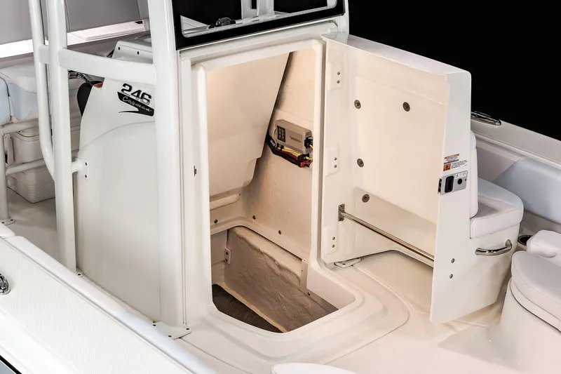 Slide: The Image of Manufacturer Provided Image: 2022 Robalo 246 Cayman boat interior storage compartment. - 13