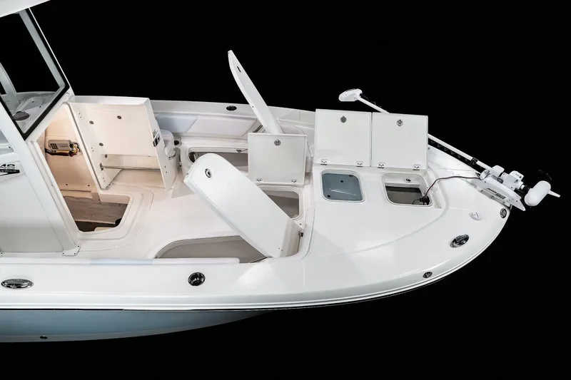 Slide: The Image of Manufacturer Provided Image: 2022 Robalo 246 Cayman boat with open storage compartments and seating. - 3