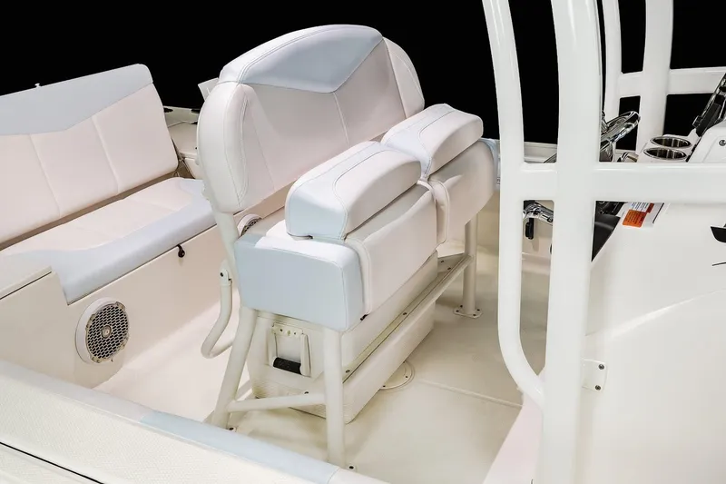 Slide: The Image of Manufacturer Provided Image: 2022 Robalo 246 Cayman boat interior seating and console. - 7