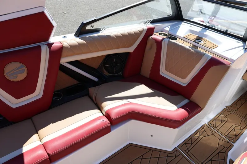 Slide: The Image of Luxurious interior of 2022 Tigé 25ZX boat with red and tan seating. - 32