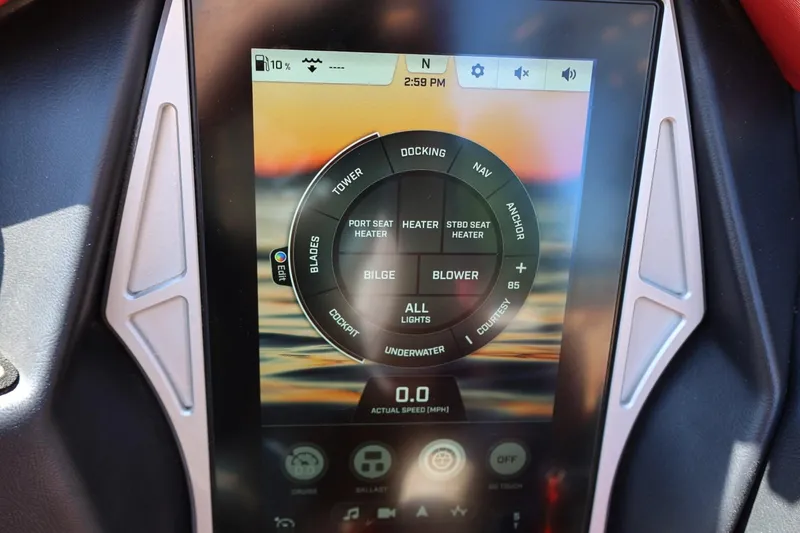 Slide: The Image of Touchscreen control panel of 2022 Tigé 25ZX boat, displaying various settings and features. - 58