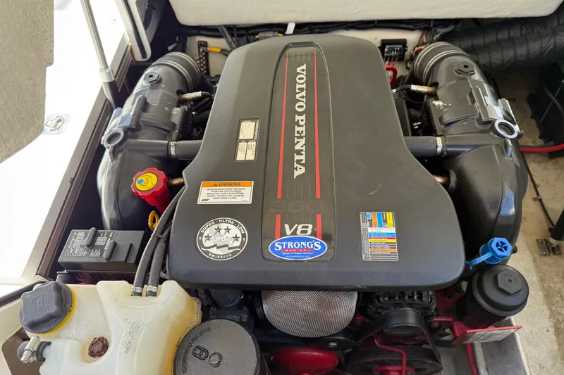 Slide: The Image of Volvo Penta V8 engine in a 2015 Cobalt 26SD boat, showcasing detailed components. - 17