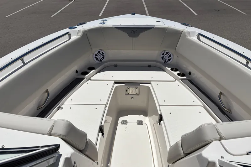 Slide: The Image of 2026 Sailfish 276 DC boat interior with seating and storage compartments. - 19