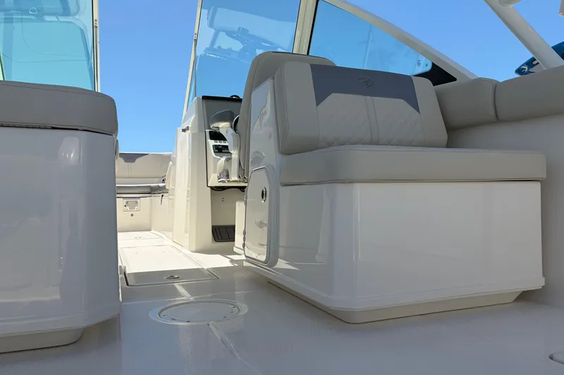 Slide: The Image of 2026 Sailfish 276 DC boat interior with modern seating and sleek design. - 22