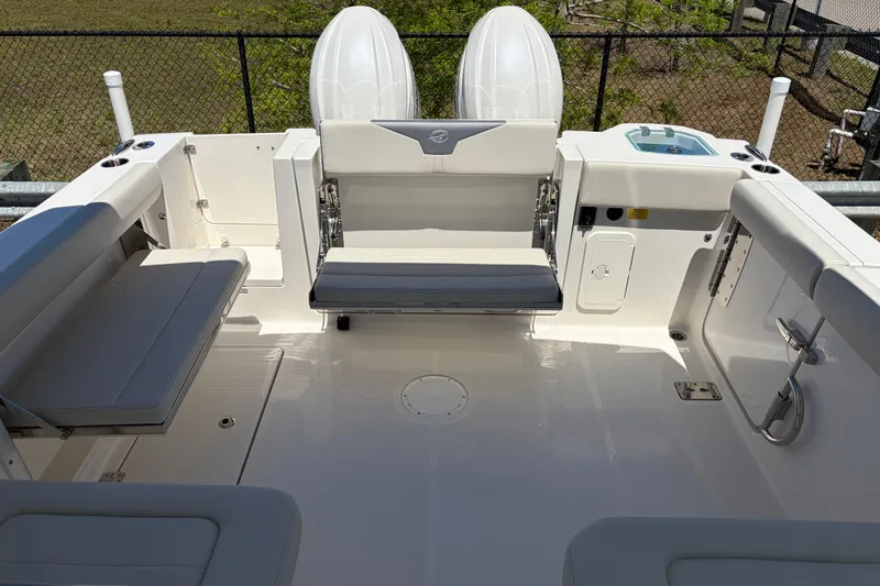 Slide: The Image of 2026 Sailfish 276 DC boat interior with seating and storage compartments. - 24