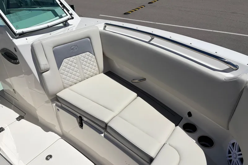 Slide: The Image of Luxurious seating on 2026 Sailfish 276 DC boat, featuring elegant white upholstery. - 30