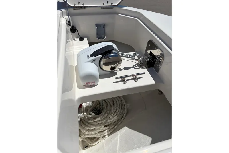 Slide: The Image of Anchor system on 2026 Sailfish 276 DC boat, featuring chain and rope storage. - 45