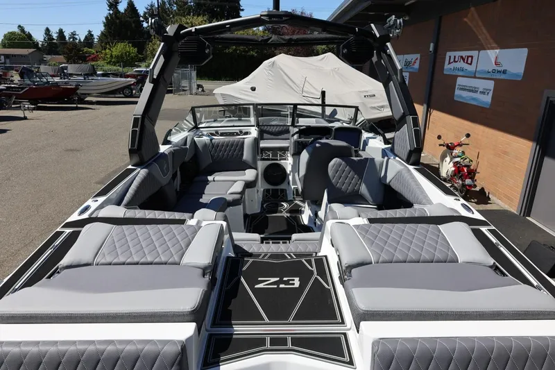 Slide: The Image of 2026 Tigé Z3 boat interior with luxurious seating and modern design. - 12