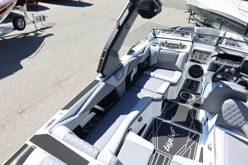 Slide: The Image of 2026 Tigé Z3 boat interior with modern seating and sleek design. - 19