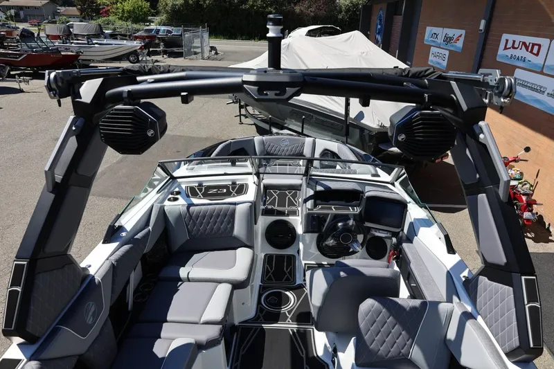 Slide: The Image of 2026 Tigé Z3 boat interior with modern seating and advanced dashboard features. - 21
