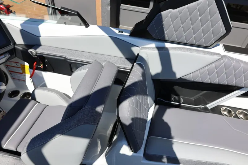Slide: The Image of Interior of 2026 Tigé Z3 boat featuring sleek, modern seating with quilted upholstery. - 29