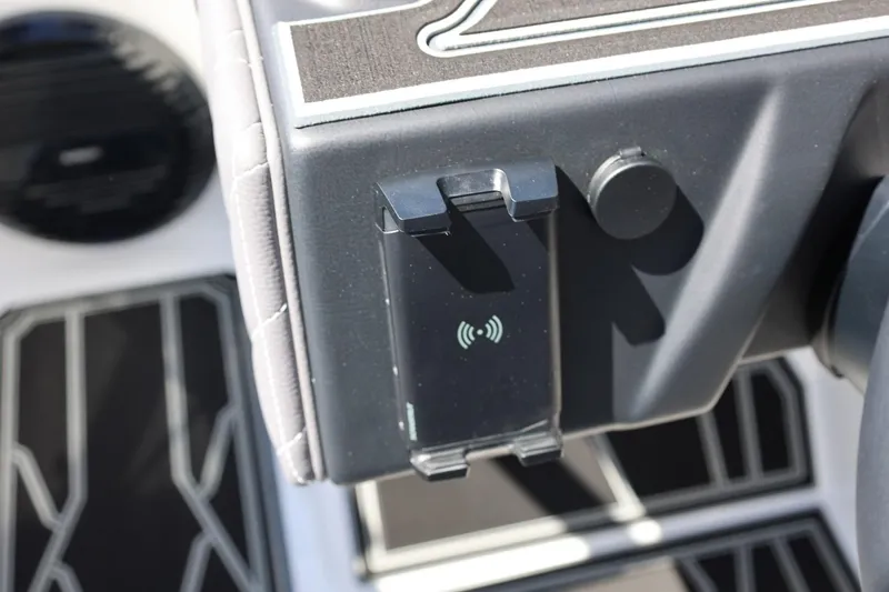 Slide: The Image of Dashboard of 2026 Tigé Z3 boat featuring a wireless charging pad. - 41