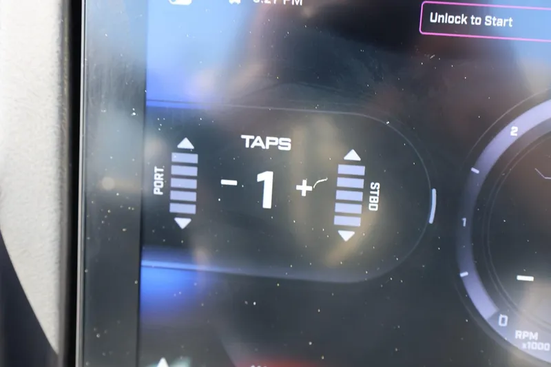 Slide: The Image of Dashboard display of 2026 Tigé Z3 boat showing TAPS adjustment settings. - 47
