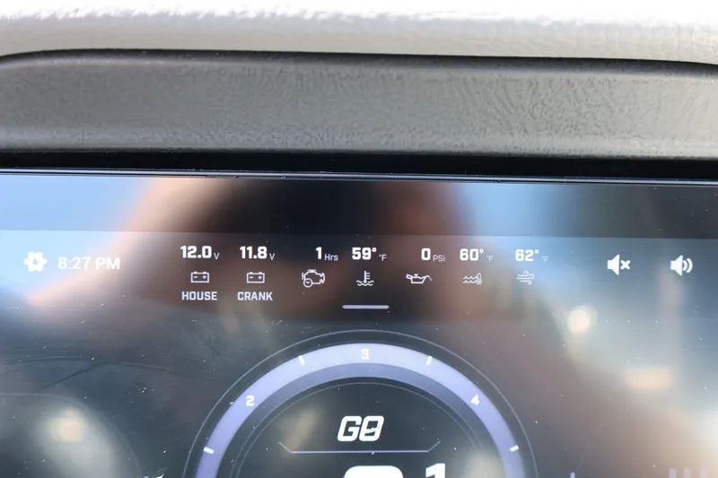 Slide: The Image of Dashboard display of 2026 Tigé Z3 boat showing battery voltage and temperature readings. - 48