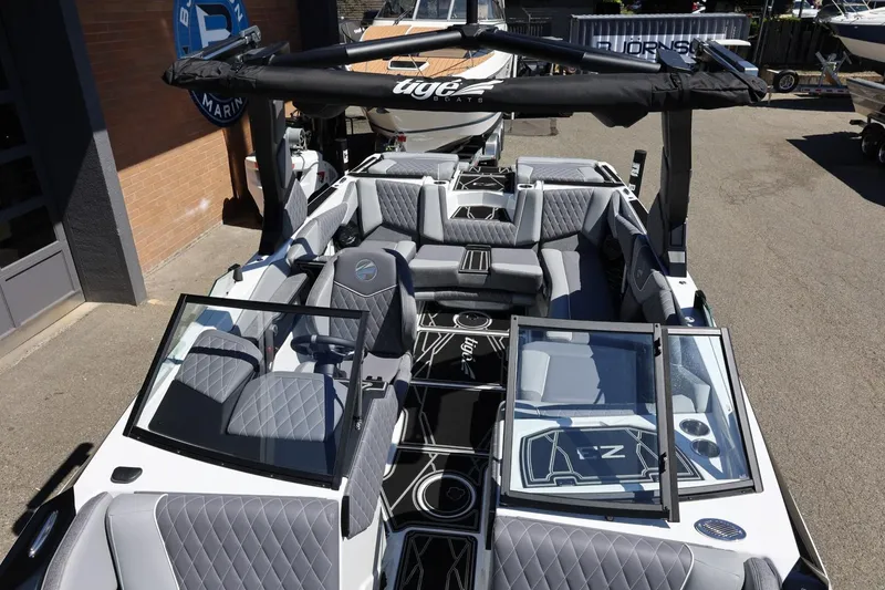 Slide: The Image of 2026 Tigé Z3 boat interior with modern seating and sleek design. - 59